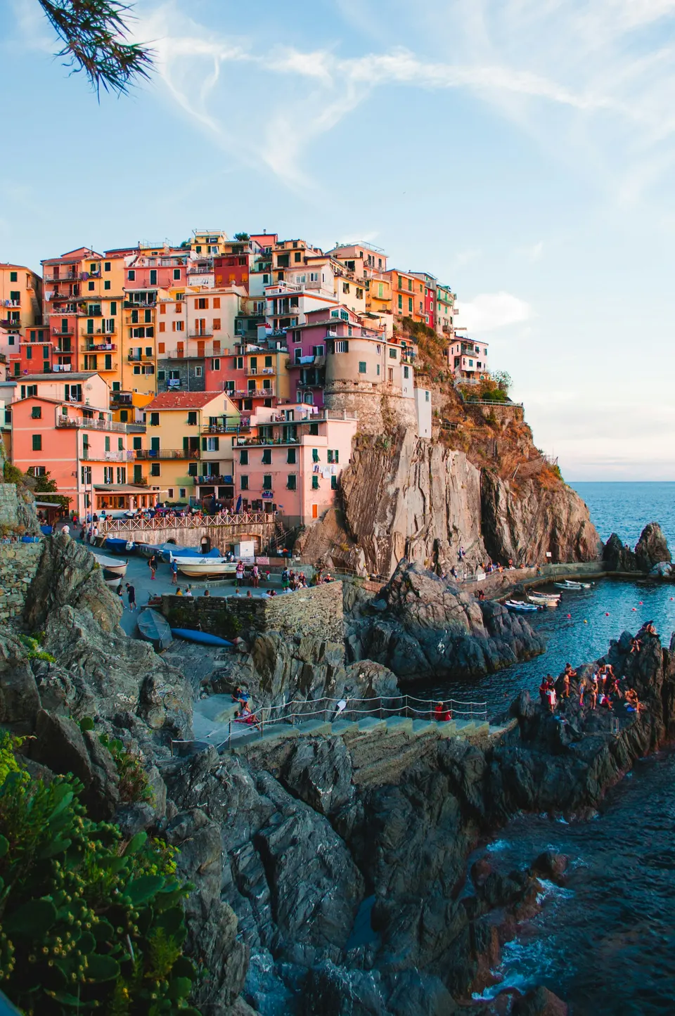 Colorful Italian coastal village rising above the sea